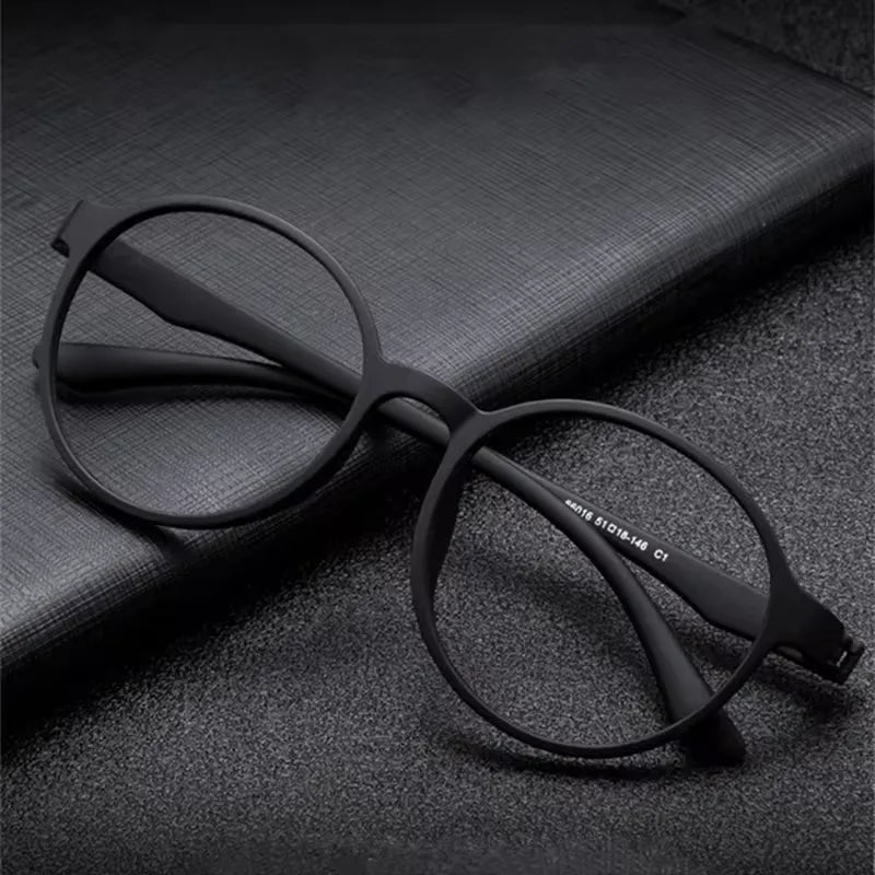 StorePilot retro blue light protection glasses with clear frames and tinted lenses, designed to reduce screen eye strain.