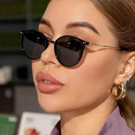 Chic retro round sunglasses with dark lenses and metal frame, stylish eyewear by StorePilot.