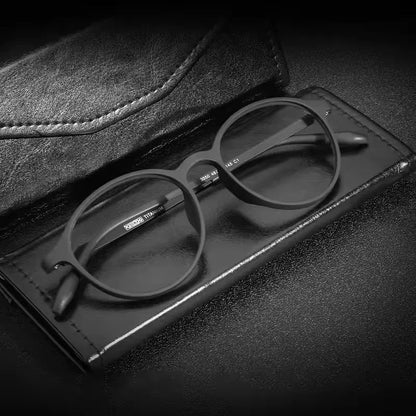 Retro blue light protection glasses by StorePilot with clear lenses and blue frames, designed to reduce eye strain from screens.