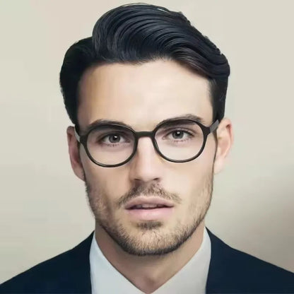 Retro blue light protection glasses from StorePilot with clear lenses and blue frames, designed for digital screen use.