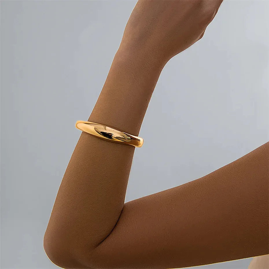 Creative Punk Metal Bangle Bracelet with edgy design, featuring bold metal accents and a modern punk style.
