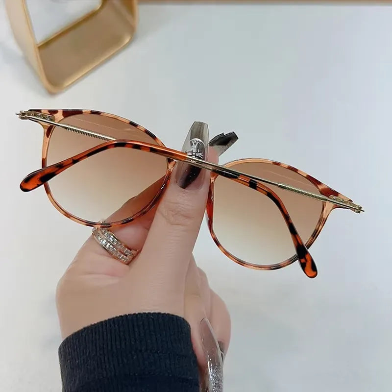 Retro round sunglasses by StorePilot featuring chic, stylish frames perfect for a vintage look and sunny days.