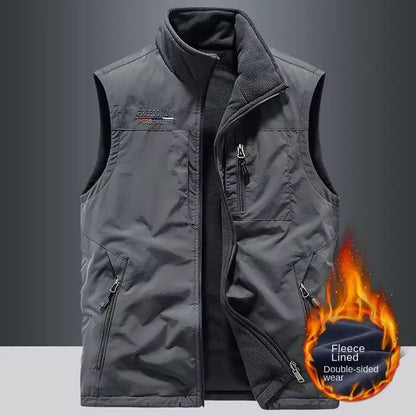 Men's casual heated vest by StorePilot, showing close-up of black insulated vest with heating controls and soft fabric interior.