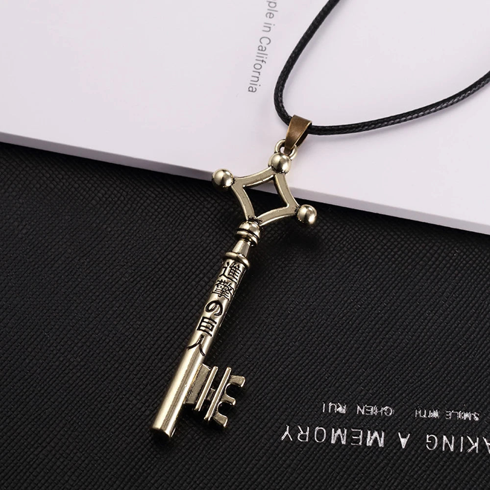 Eren Key anime necklace featuring a detailed pendant inspired by the 2024 anime series, worn on a black chain.