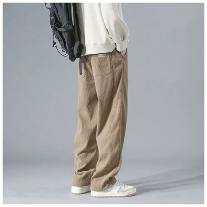 Men's trendy corduroy pants in a classic fit, made by StorePilot, shown in a versatile dark color with a focus on the fabric texture.
