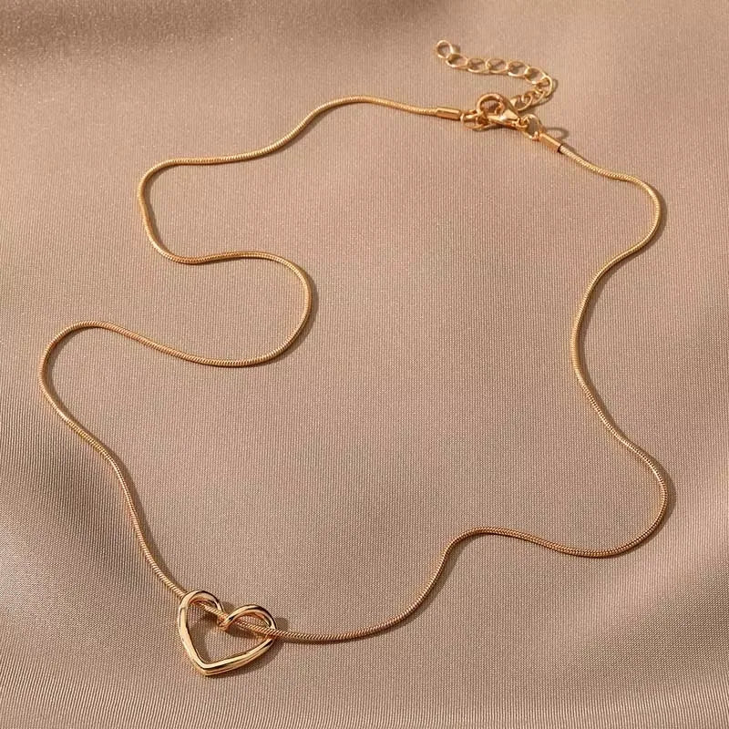 Heart pendant necklace featuring a silver heart-shaped charm on a delicate chain, stylish jewelry by StorePilot.