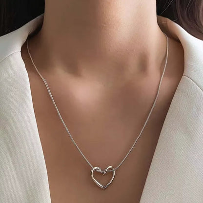 Heart pendant necklace featuring a silver heart-shaped charm on a delicate chain, stylish jewelry by StorePilot.