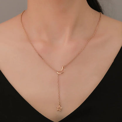 Moon and star choker necklace featuring a sleek design, ideal for stylish accessories and layered jewelry looks.