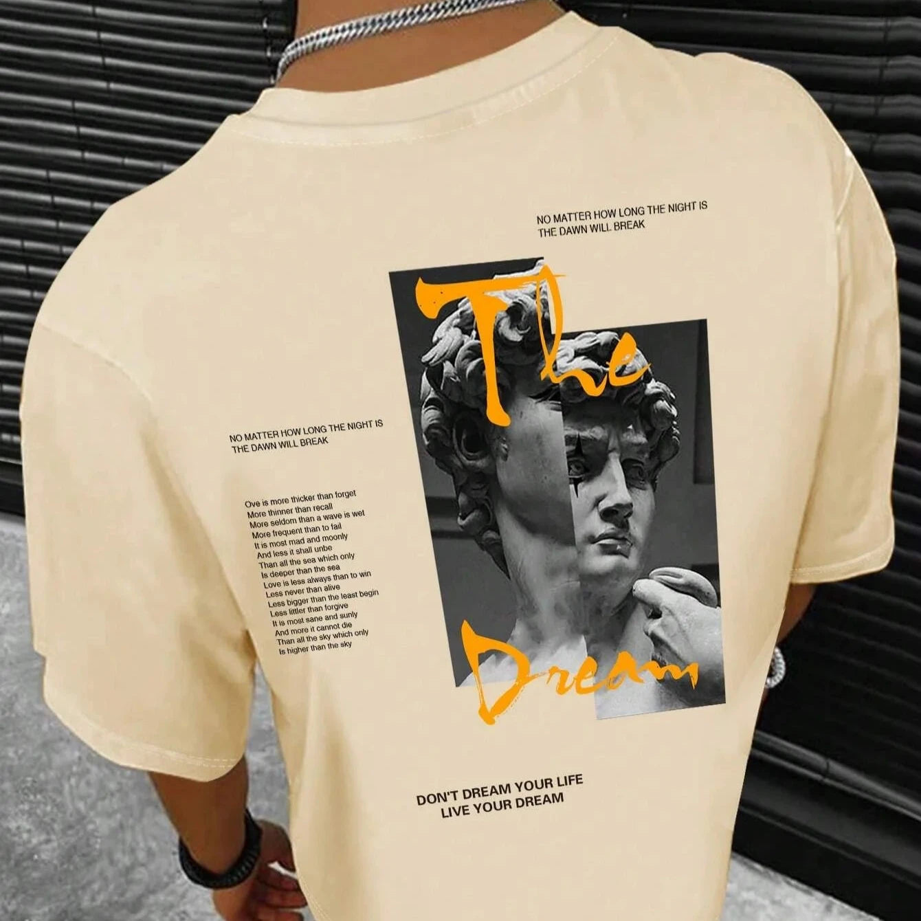 Dream Life men's cotton streetwear tee in black with a relaxed fit and crew neckline, perfect for casual everyday wear.