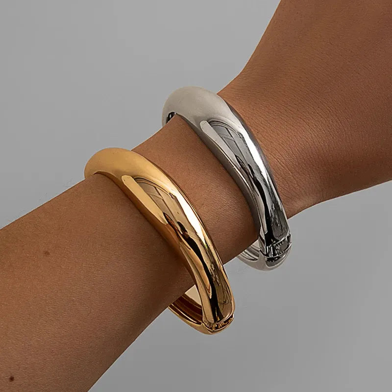 Gold-colored Creative Punk Metal Bangle Bracelet with bold, edgy design for a stylish statement accessory.