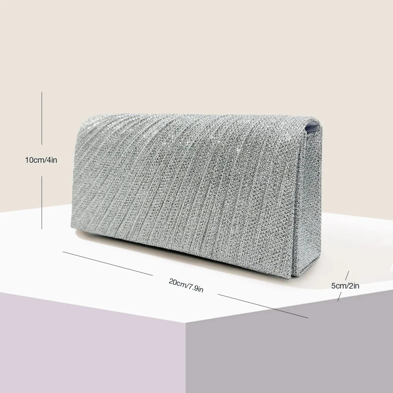 Glam Silver Evening Clutch by StorePilot featuring a sleek design and metallic finish for elegant occasions.