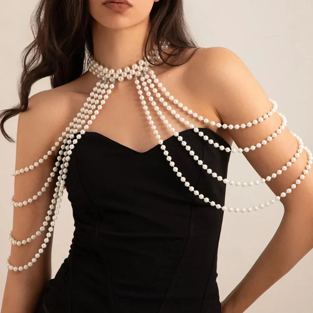 Glam Pearl Body Chain Necklace by StorePilot featuring silver chain and pearl accents draped across the torso, elegant jewelry accessory.