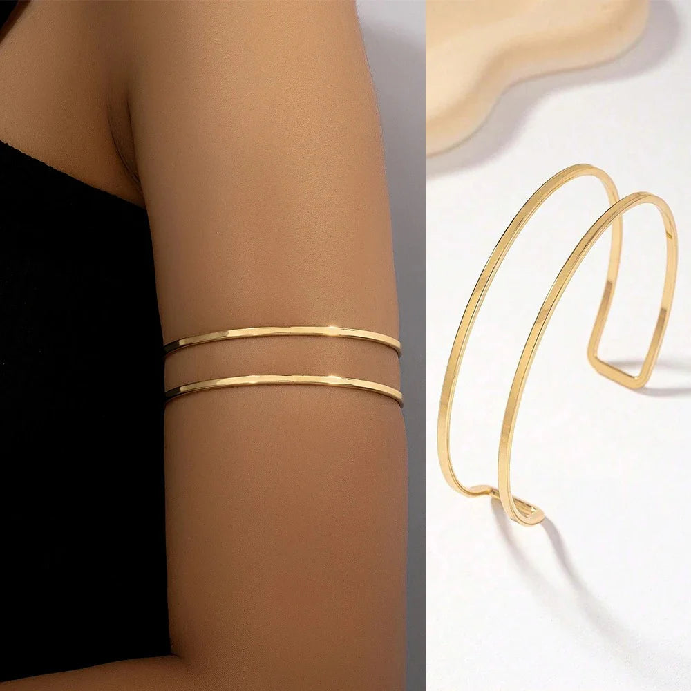 Gold Glam adjustable arm cuff bracelet featuring a sleek, modern design with a polished finish and stylish fit.