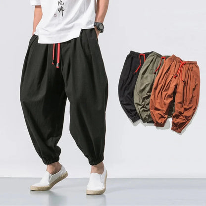 Men's chic harem joggers from StorePilot featuring relaxed fit, tapered design, and comfortable fabric, shown in a stylish pose.
