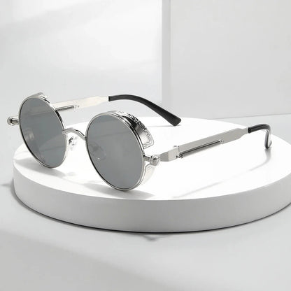 Steampunk metal round sunglasses with intricate detailing and dark tinted lenses, stylish eyewear by StorePilot
