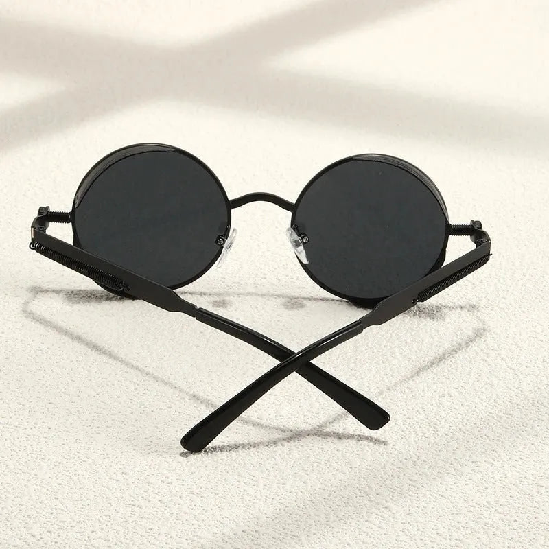 Steampunk metal round sunglasses with vintage-style frames and dark lenses, stylish eyewear by StorePilot.