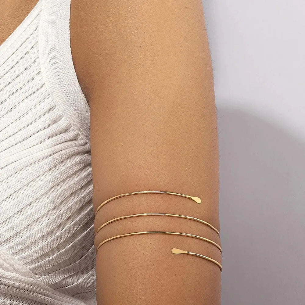 Gold Glam Adjustable Arm Cuff with sleek design and open fit, perfect for stylish accessories and elegant arm jewelry.