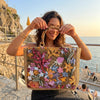 Bamboo handle straw tote bag by TheChicRoom with woven straw body and sturdy bamboo handles for casual summer style.
